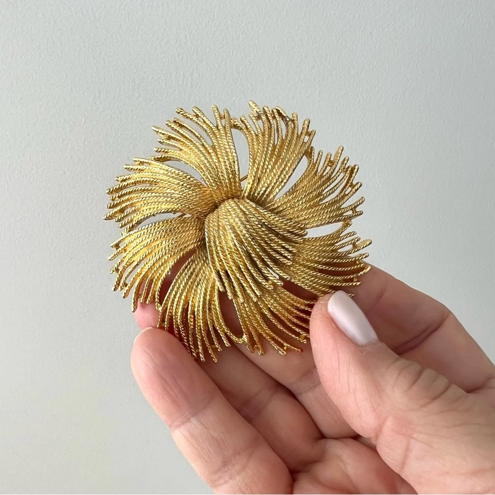 Vintage Monet pin from 1960’s with some patina on the metal - lovely for…